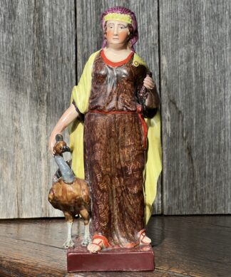 Staffordshire figure of Juno and the Peacock, Brown Base, c. 1800