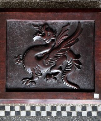 Australiana carved cedar panel of a dragon, 20th c.