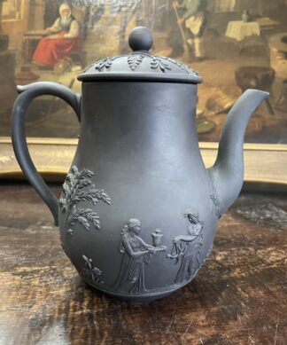 Wedgwood basalt coffee pot with classical relief,   1920