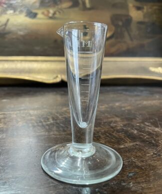 Small victorian measuring beaker in millilitres