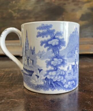 Staffordshire pottery mug with blue scenic print, C. 1840