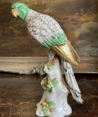 Porcelain Parrot on a tree trunk, French earlier 20th c.