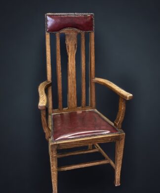 Oak Arts & Crafts armchair, red leather, circa 1900