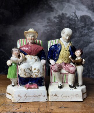 Pair of Staffordshire figures, 'Grandmother & Grandfather' C. 1845