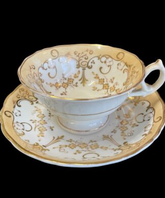 Davenport beige and gilt cup and saucer, pat. 535, c.1840