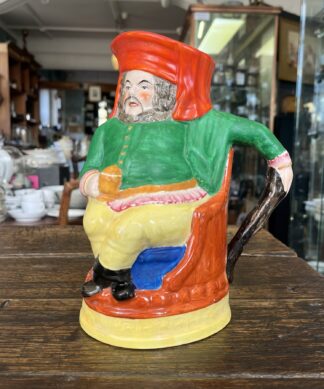 Staffordshire pottery mug, seated Gent C. 1870