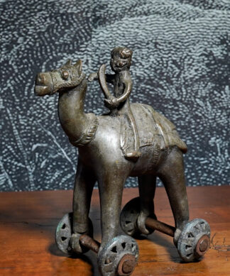 Indian Bronze Dhokra toy camel & rider on wheels, 19th/ earlier 20th century