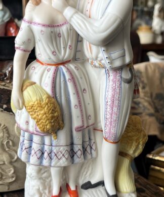 Victorian  bisque porcelain figure group, a harvest couple, C 1870