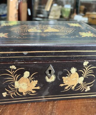 Chinese Export black lacquer box, gilt figures + flowers, mid- 19th century