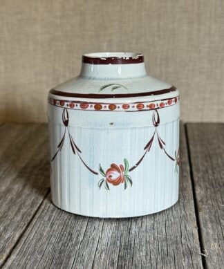 Creamware tea canister, engine turned with flower swags, c. 1790