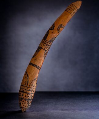 Australian Aboriginal boomerang, burnt decoration, 20th century