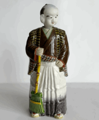 Japanese Porcelain Nodding figure, Man with broom,  c. 1900