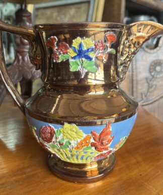 Copper lustre jug, mask spout, dolphin handle, colourful flowers, c. 1830