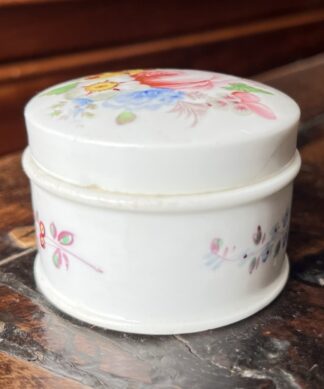 Small bone china lidded box, flower group, c.1820