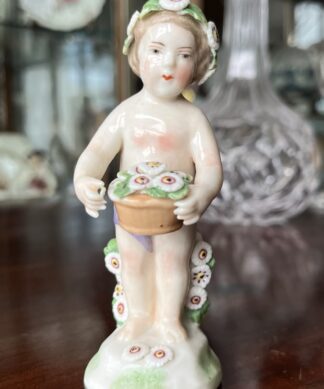 French Porcelain figure of a Derby-style flower boy, c. 1900