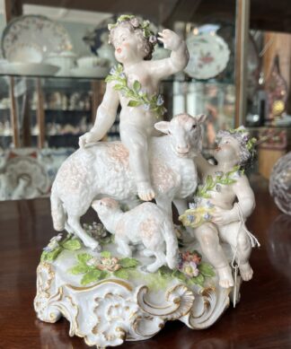 Sampson porcelain group of children with sheep, Meissen style, late 19th century