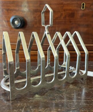 Stylish silverplate toast rack,Victorian gothic ’ form,C. 1880