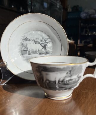 Newhall cup & saucer with black bat print of cattle, horses & deer, c. 1820