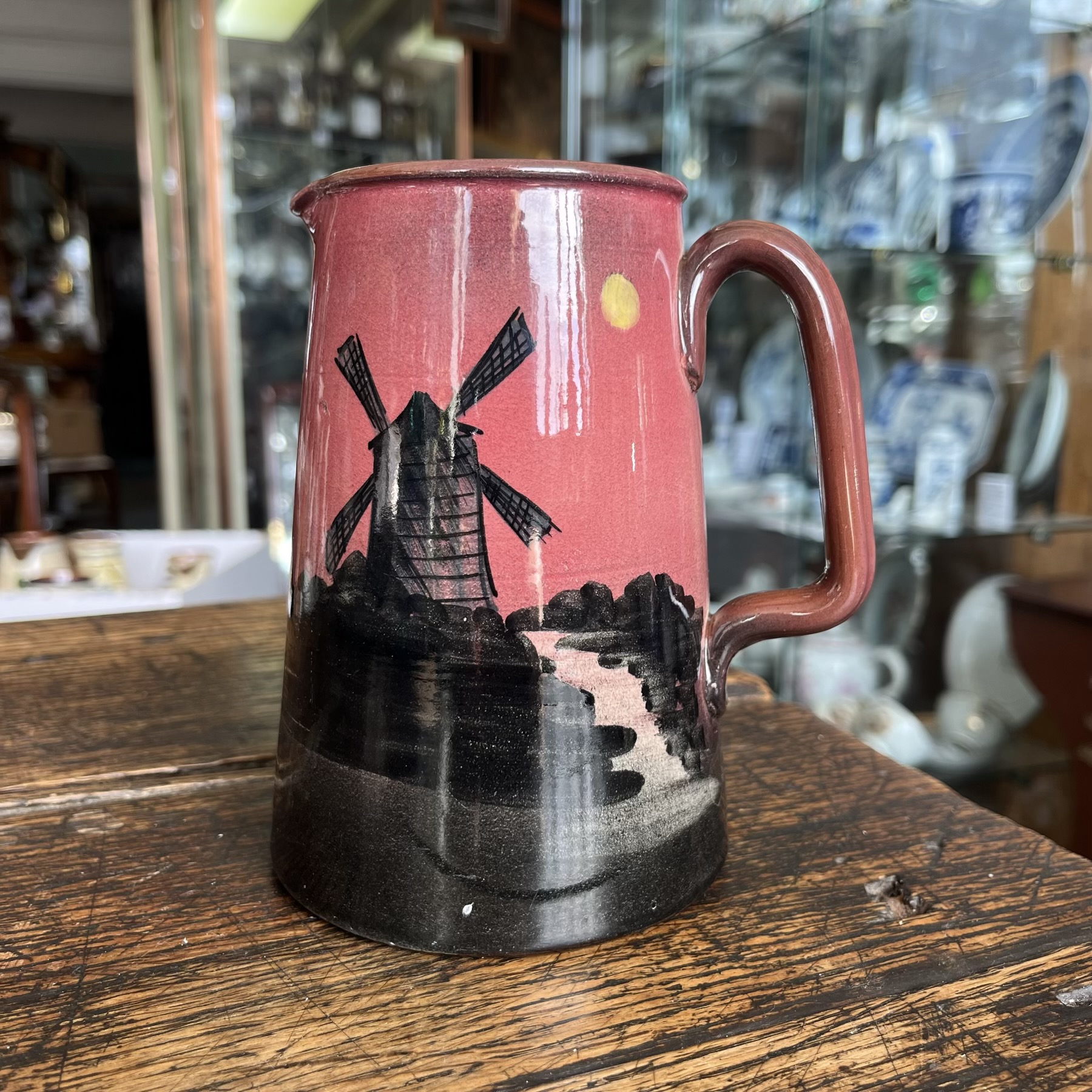 Royal Torquay Pottery scenic jug, windmills at sunset, 1930's