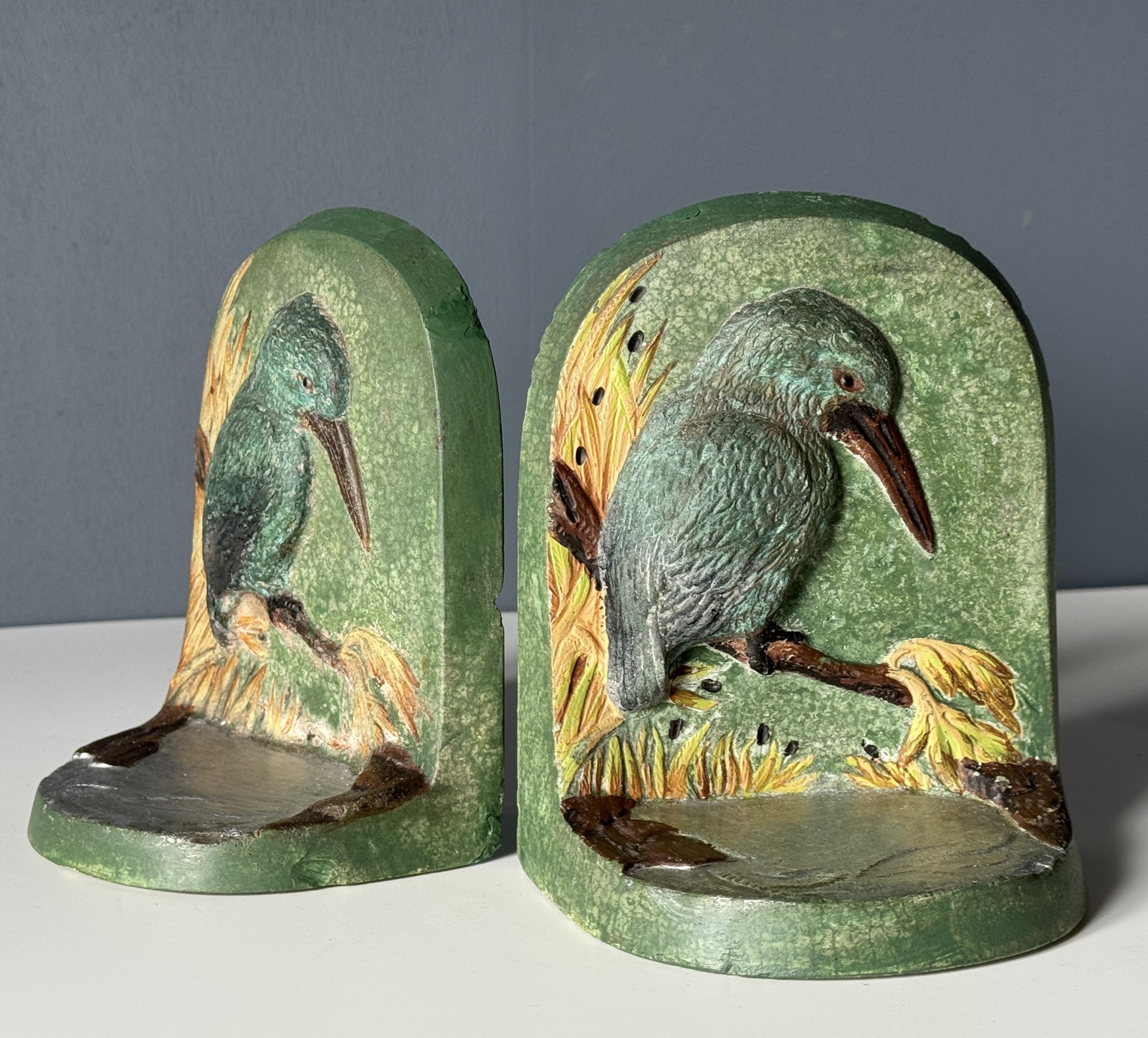 Pair of cast ceramic bookends with Kingfishers, c. 1930's