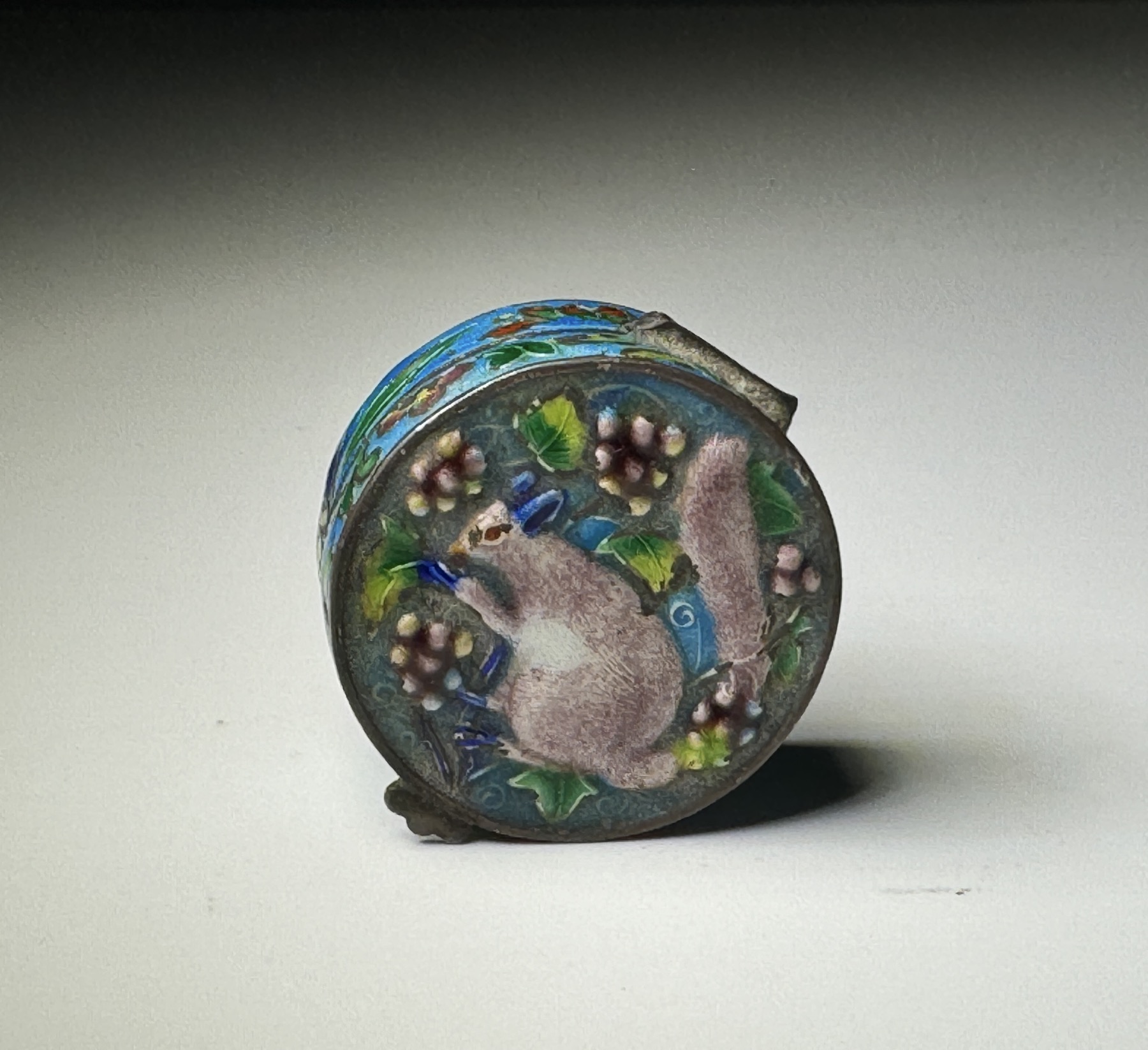 Small Chinese silver & enamel 'squirrel & grapes' box, 20th c.