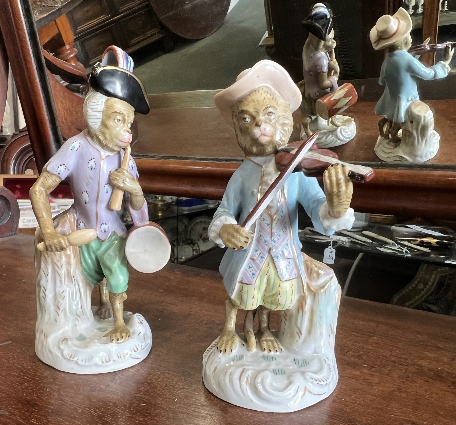 Two 'Monkey Band' figures, one a drummer, the other a fiddler late 19thC