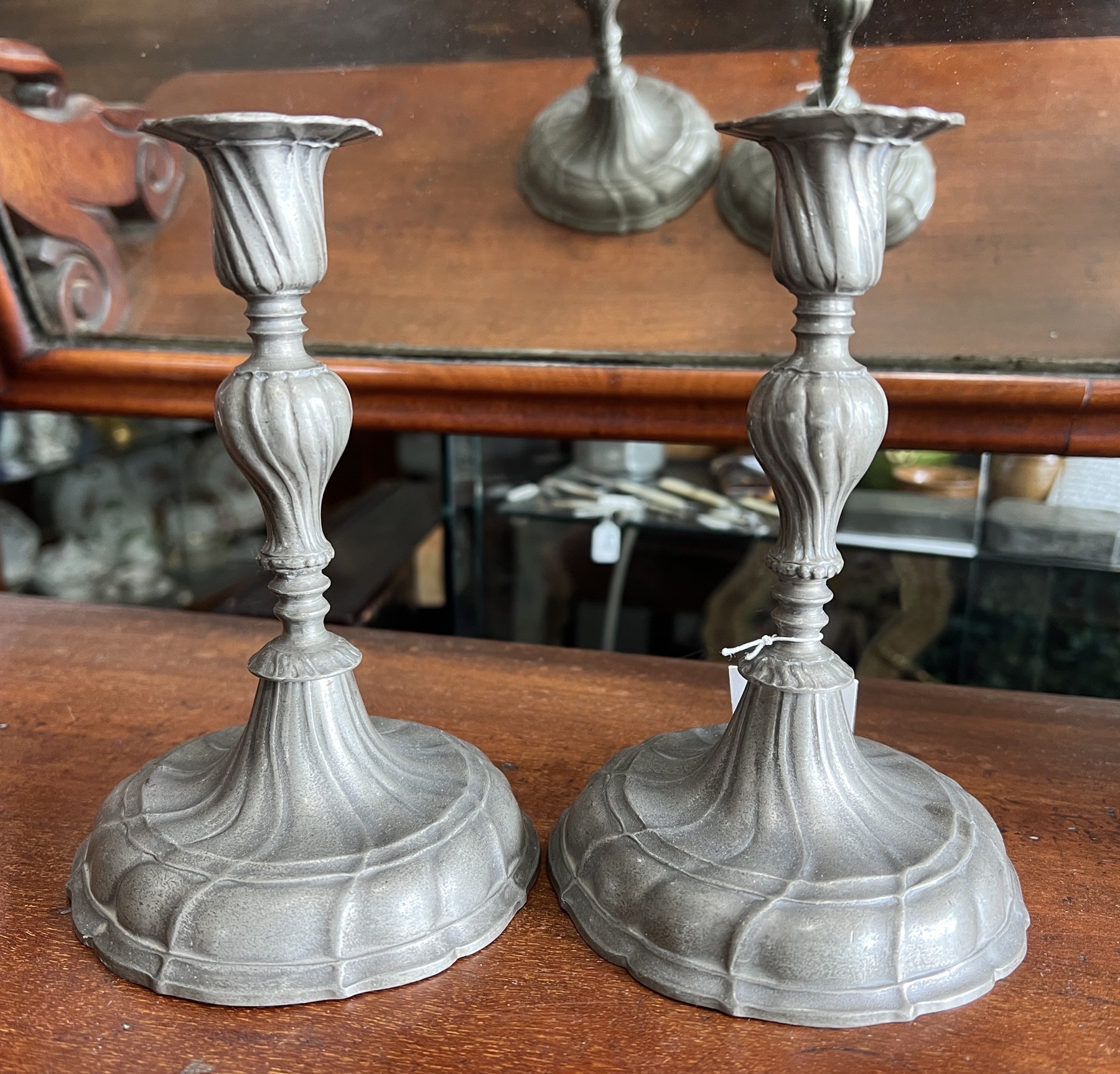 Pair of Continental Pewter candlesticks, Rococo spiral fluted, 19th century