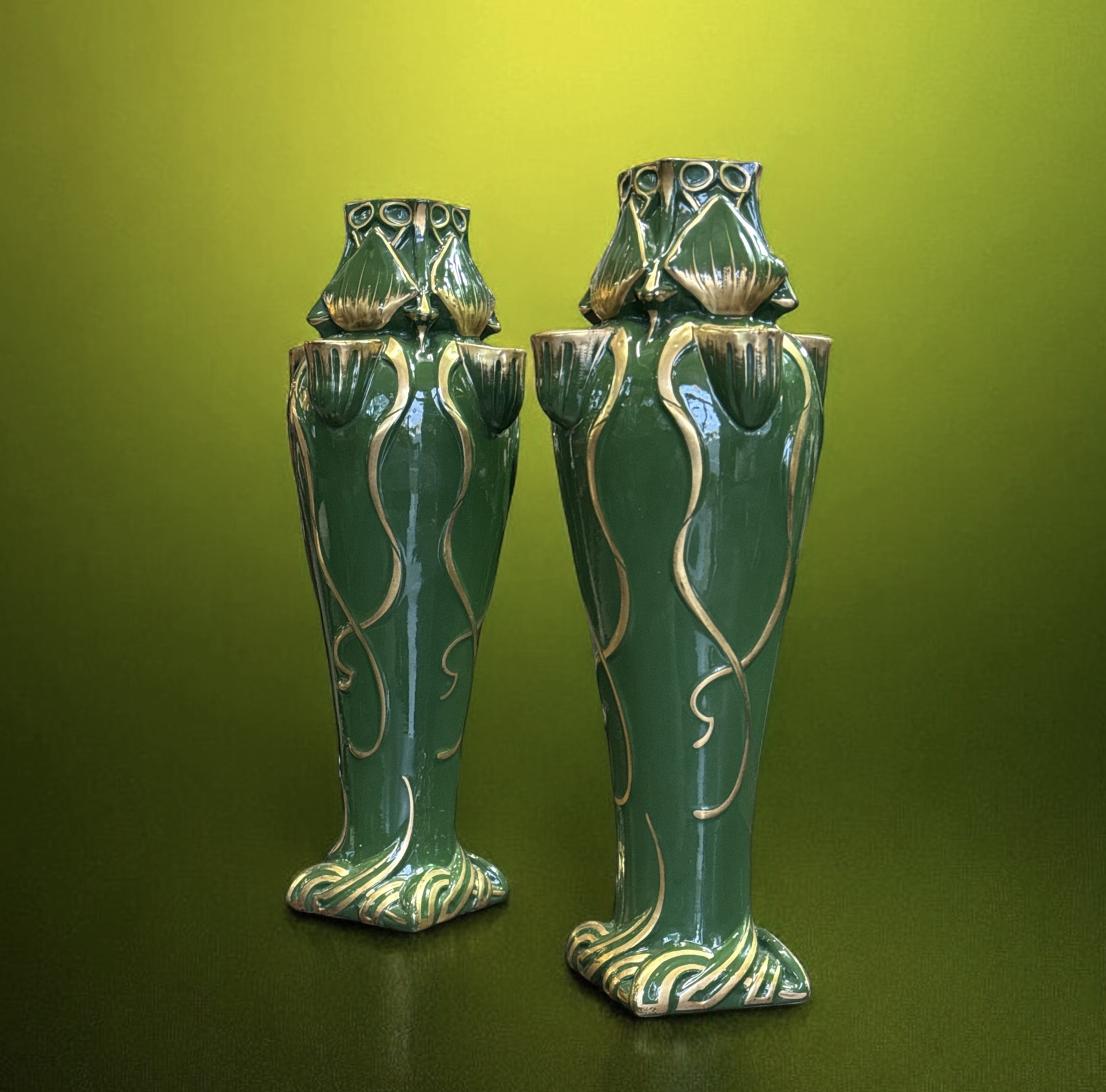 Pair of large French Art Nouveau vases, marked 'Herbinieré' by Gustav Asch, Tours, multi-spouted with green glaze, c. 1900