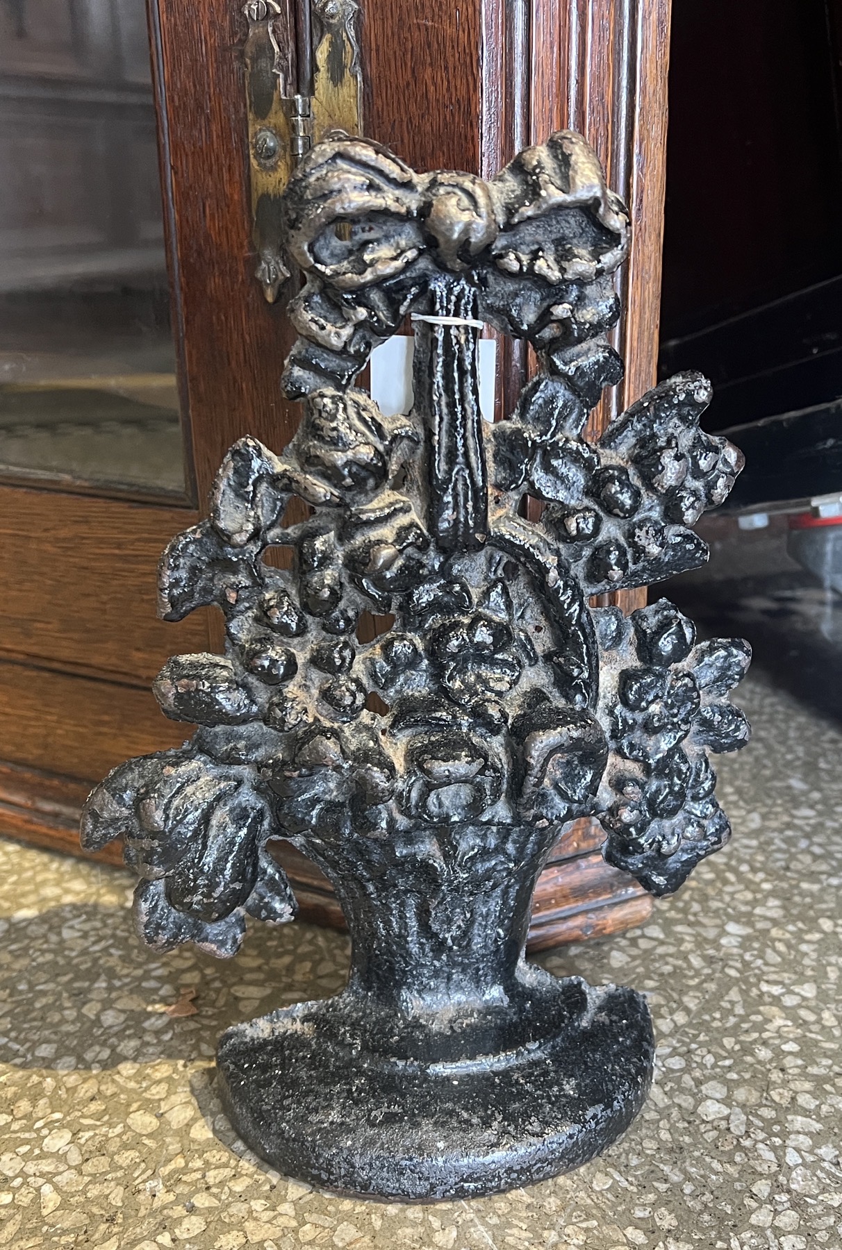 Victorian 'basket of flowers' cast iron door stop, c. 1860