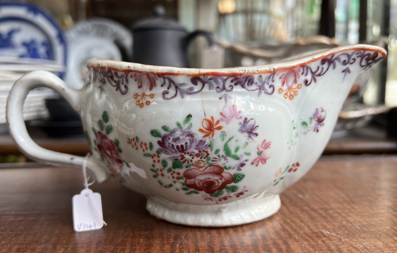 Chinese Export sauceboat with European Flowers, rococo moulding, c. 1765