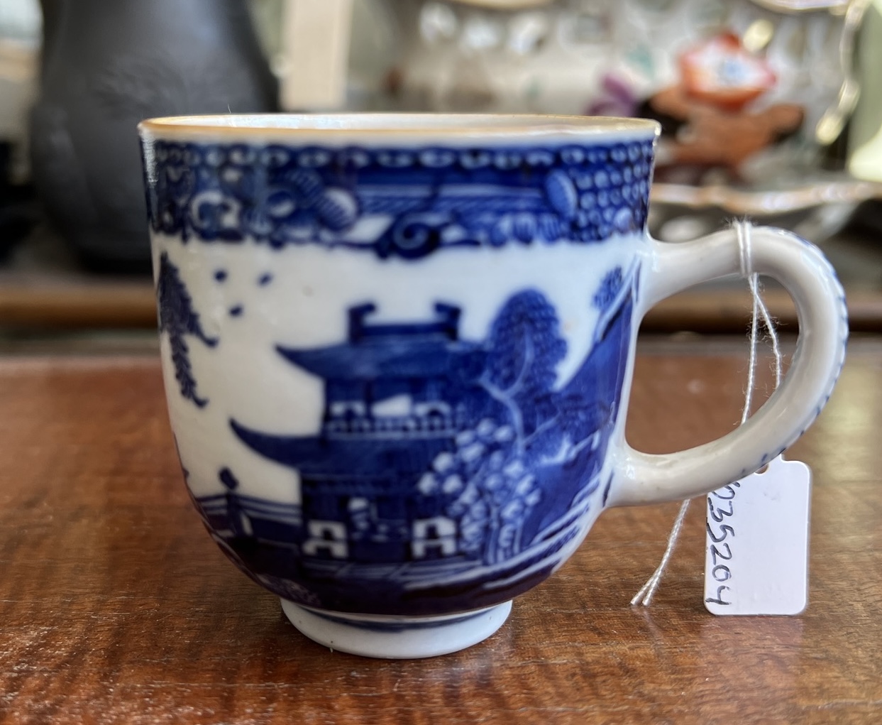 Chinese Export coffee cup, underglaze River Landscape, c. 1770